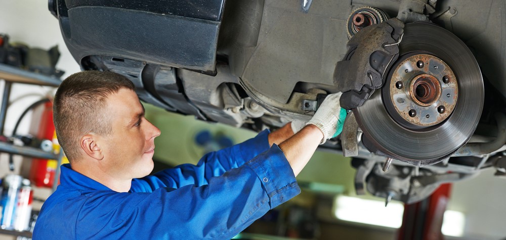 Man Repairing Brakes